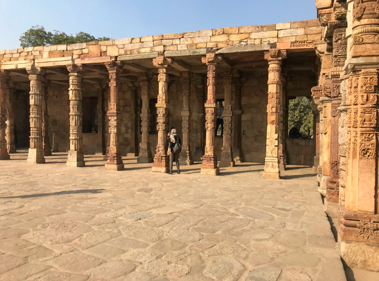 Carved stone columns at Qutub Minar